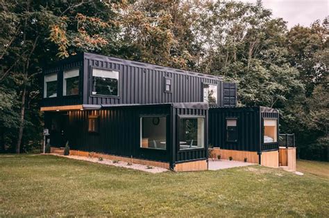 house made out of metal containers|houses built from storage containers.